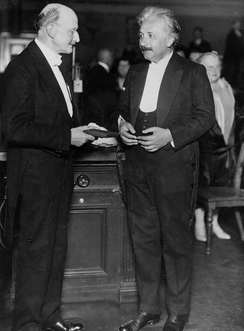 Max Planck and Albert Einstein at a ceremony, 1929